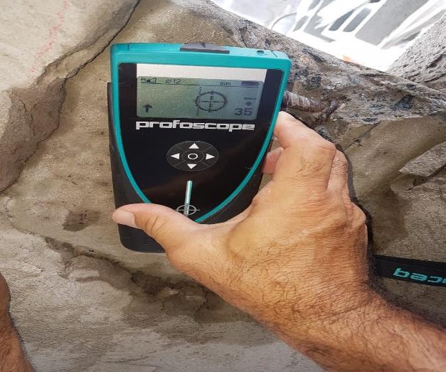 Pacometry testing used to locate reinforcement in a reinforced-concrete column at Acqua Marine.