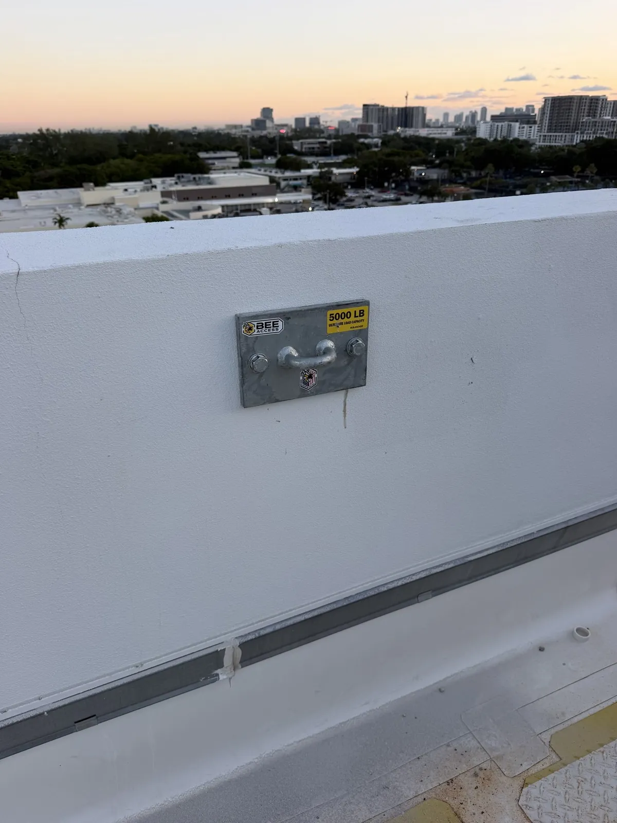 Close-up of an epoxy-set anchor installed in a concrete roof slab